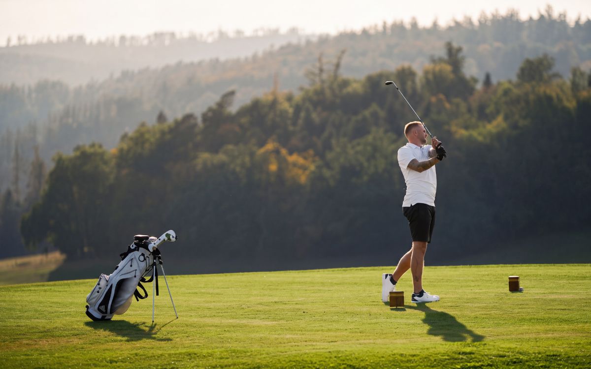 Golfer playing on the golf course in Rožnov pod Radhoštěm